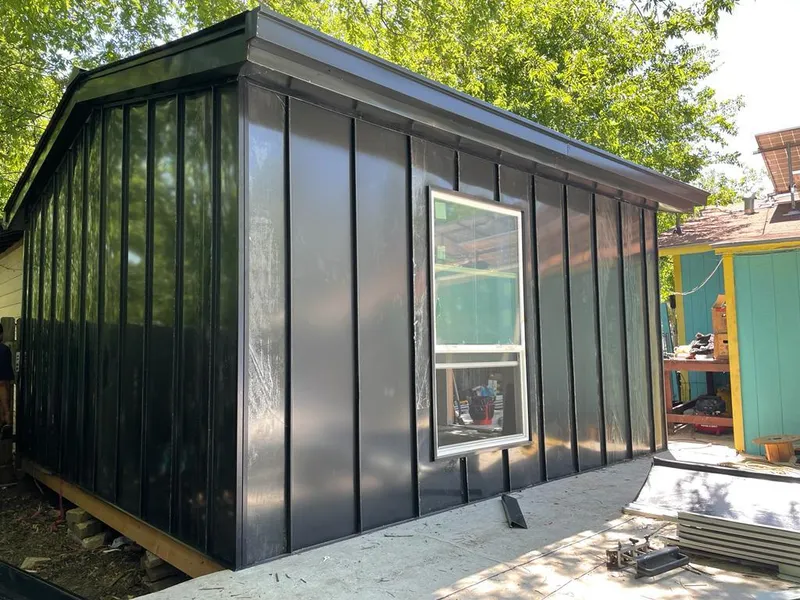 Black standing seam metal wall panels for Metal Roof Installation in Pineville